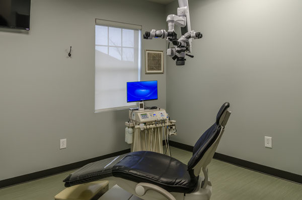 Operatory with dental chair and microscope
