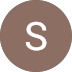 A circular brown icon with a white capital letter "S" in the center.